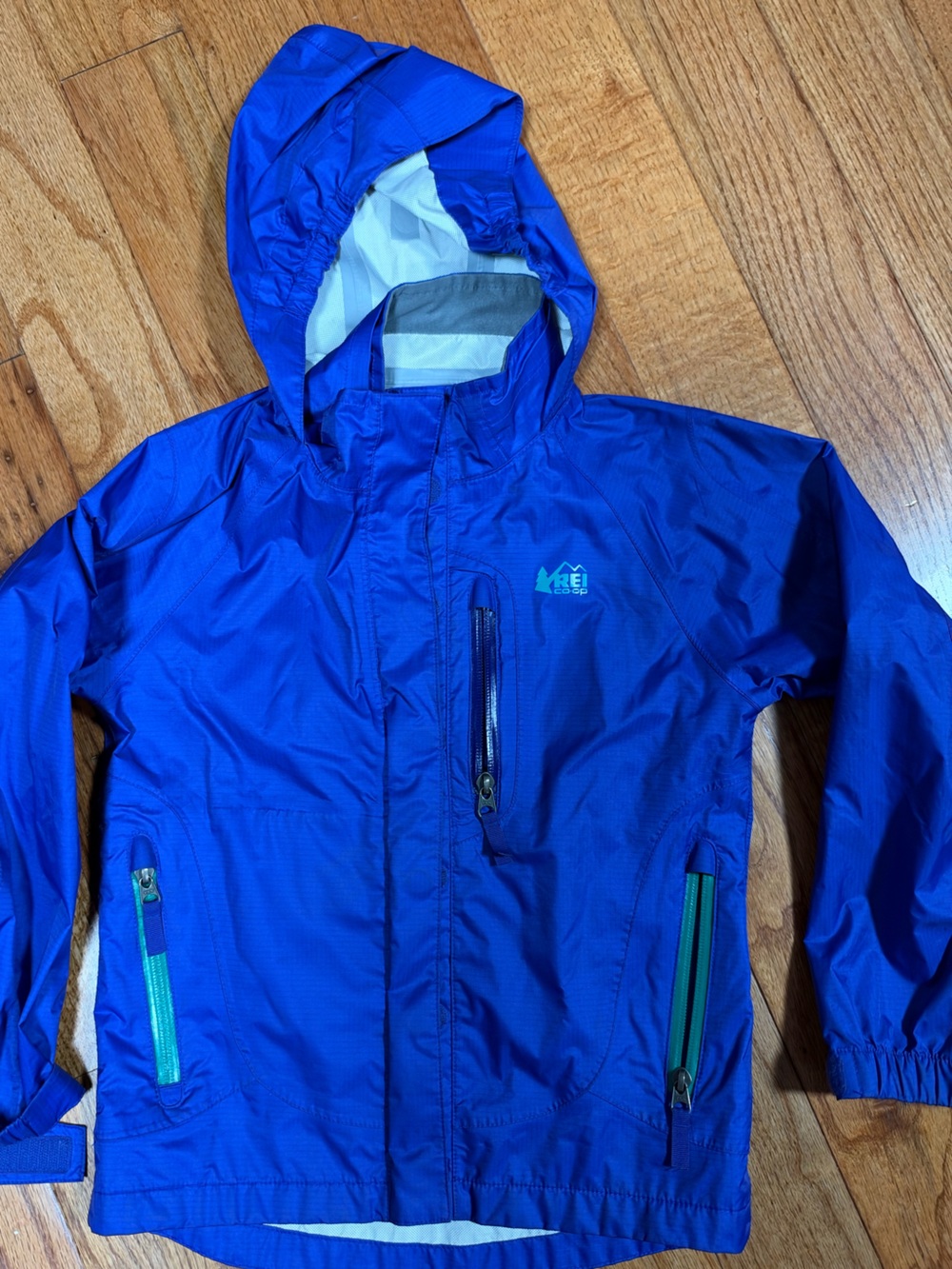 REI Royal Blue Kids' Hooded Rain Jacket with Contrast Zippers